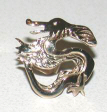 Non-Native Earrings dragon studs in gold and silver