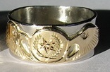 Cherokee Rings - CHr3 - Cherokee Symbol and Eagle heads in Gold on platinum with .02ct eyes